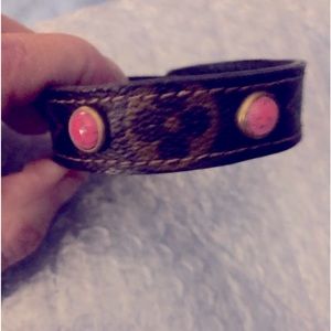 These 3 bracelets were made from the leather of an old handbag. 8” long each.